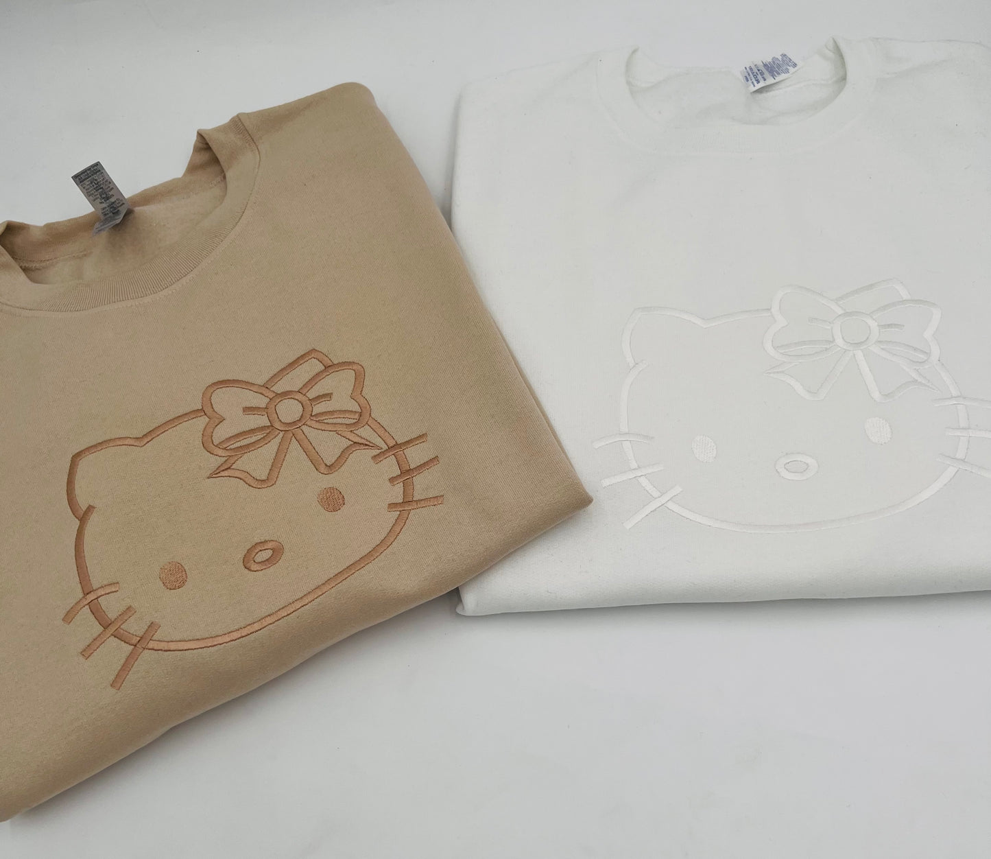 HK Kitty outline embroidered sweaters 🤎